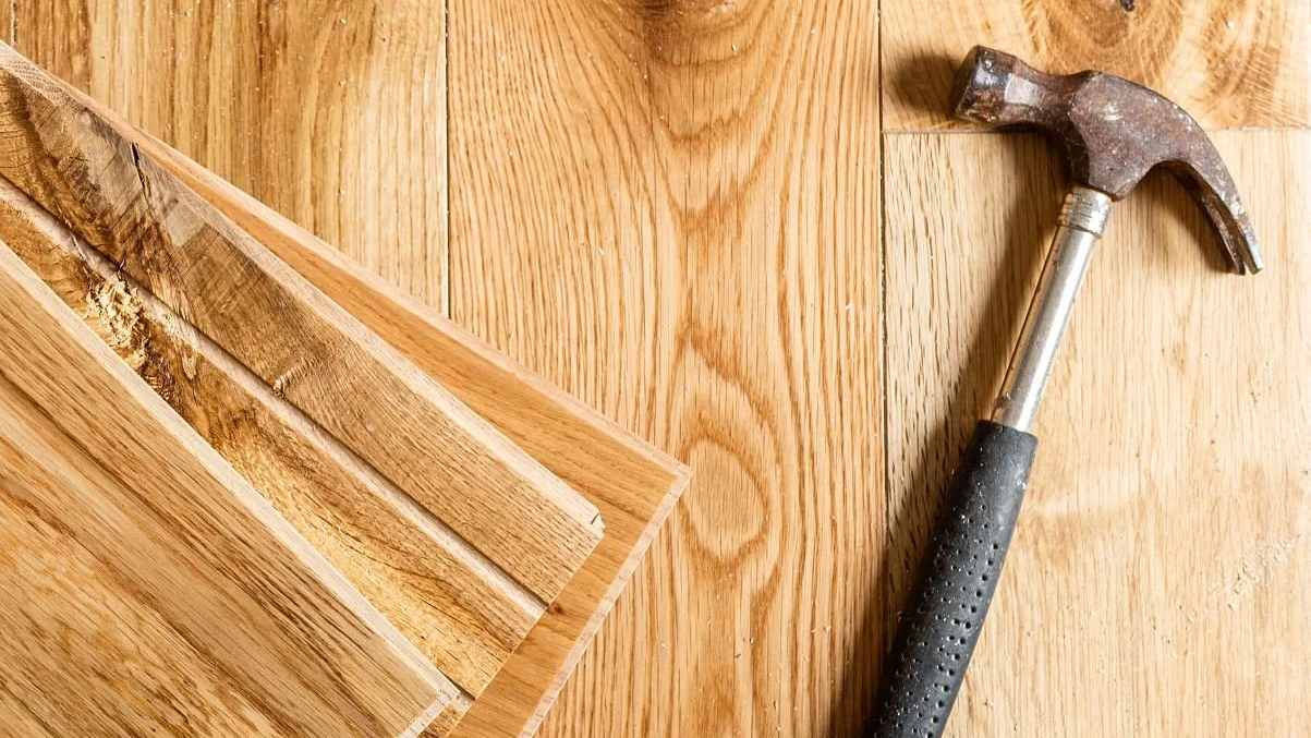 Hammer on Hardwood Plank Flooring