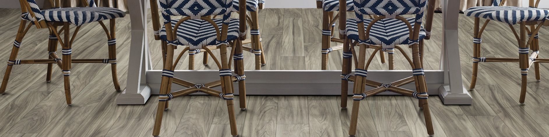woven dining chairs around a dining table - Horrigan Flooring Center in Westminster