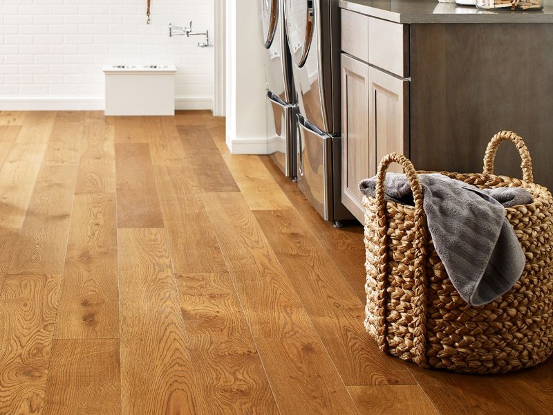 Basket laundry on a brown hardwood from Horrigan Flooring Center in Westminster